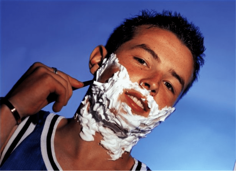 Teenager shaves and thinks about enlarging his penis