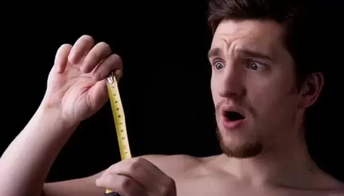 The man measured his penis before enlarging it.