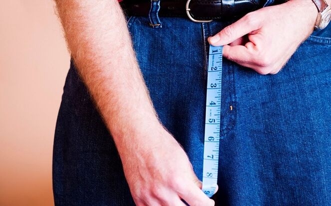 Measuring the penis before enlargement.